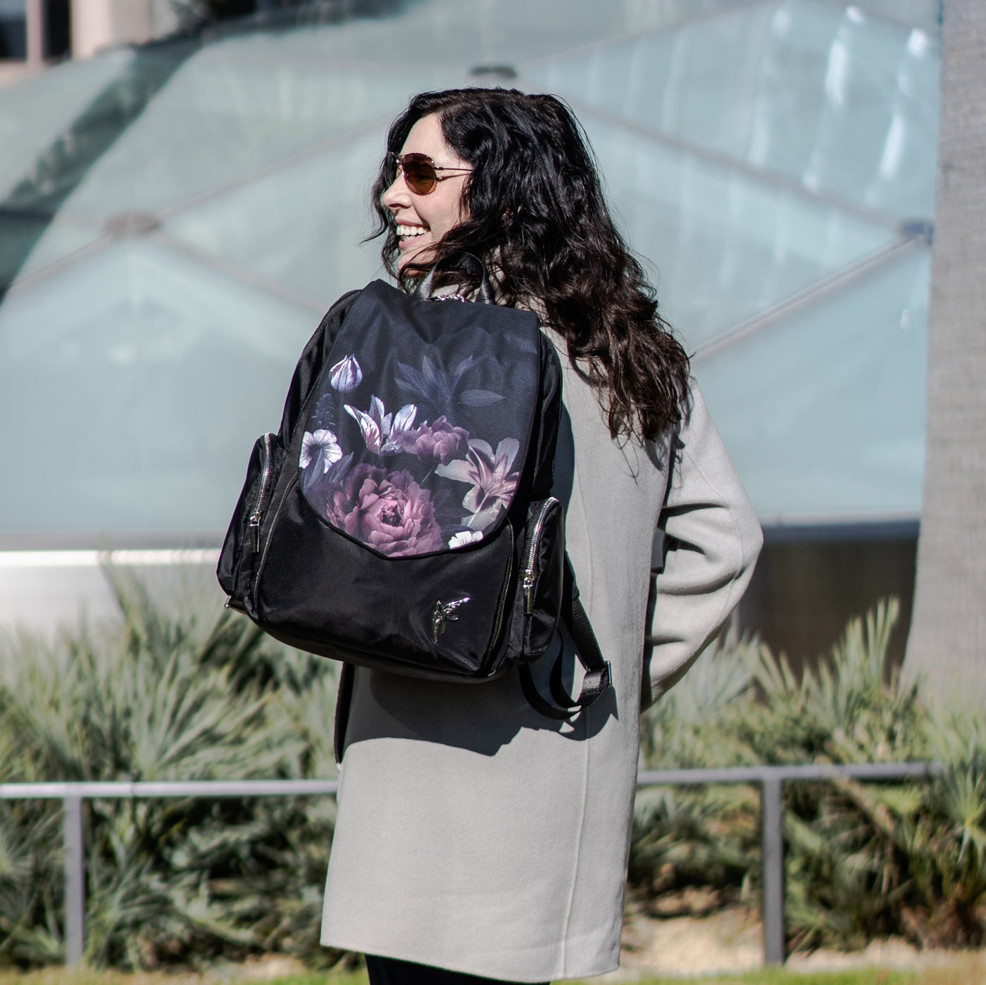 Laptop bag by GraceTech featuring the Dark Floral Print on our Laptop Backpack with a separate computer section.