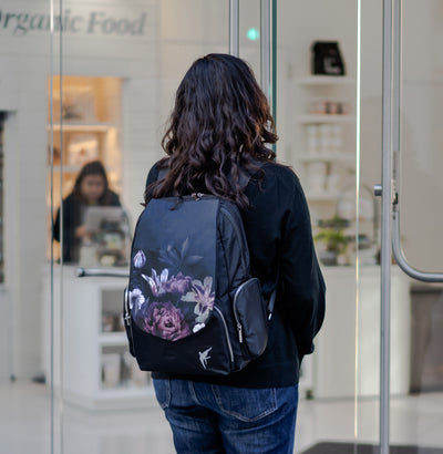 Laptop bag by GraceTech featuring the Dark Floral Print on our Laptop Backpack with a separate computer section.